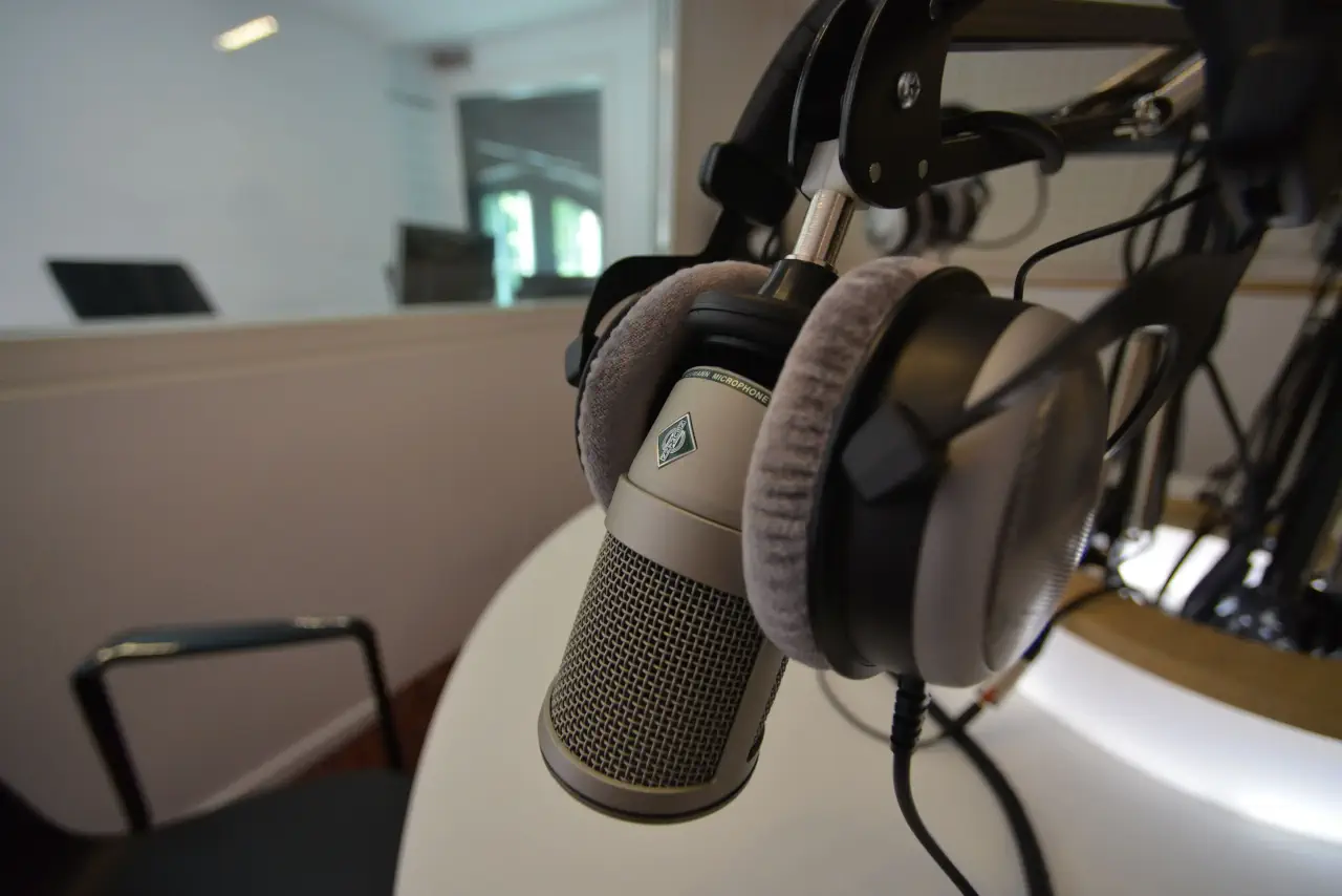 Microphone and headphones in a studio